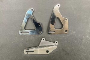 Rear brake caliper plate